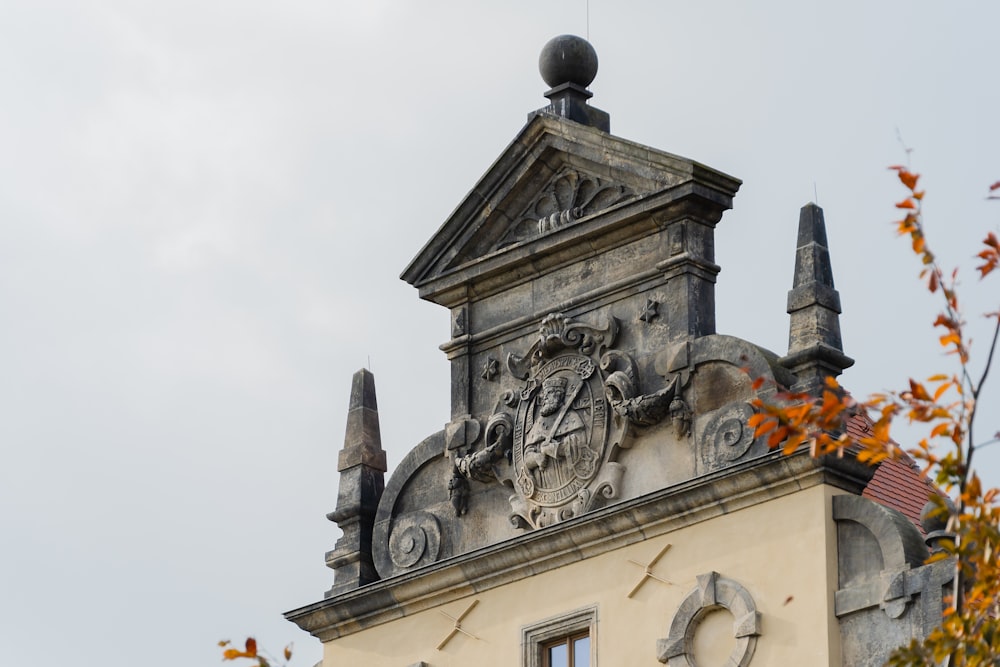 a building with a statue on top