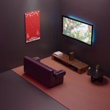 a couch and a table in a room with a tv