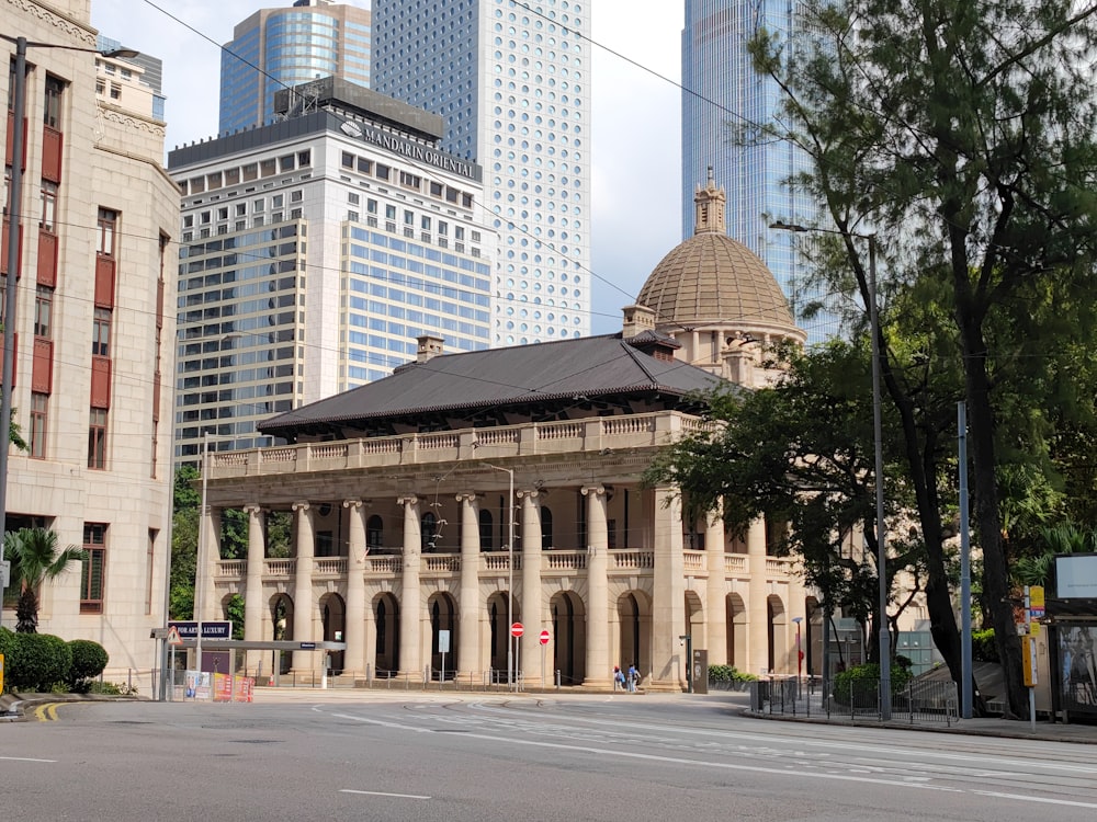 a large building with columns and a dome on top