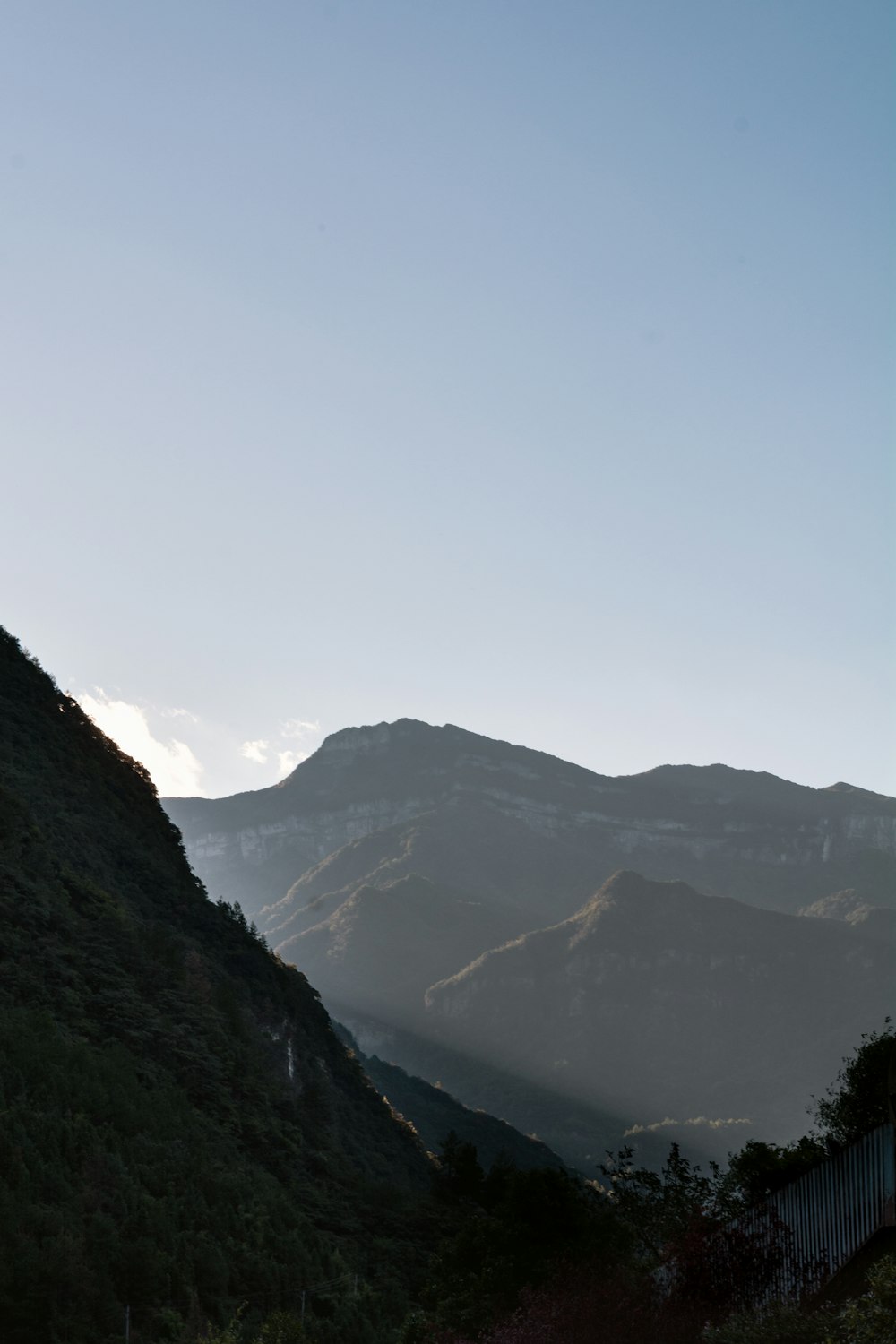 a mountain with a valley below