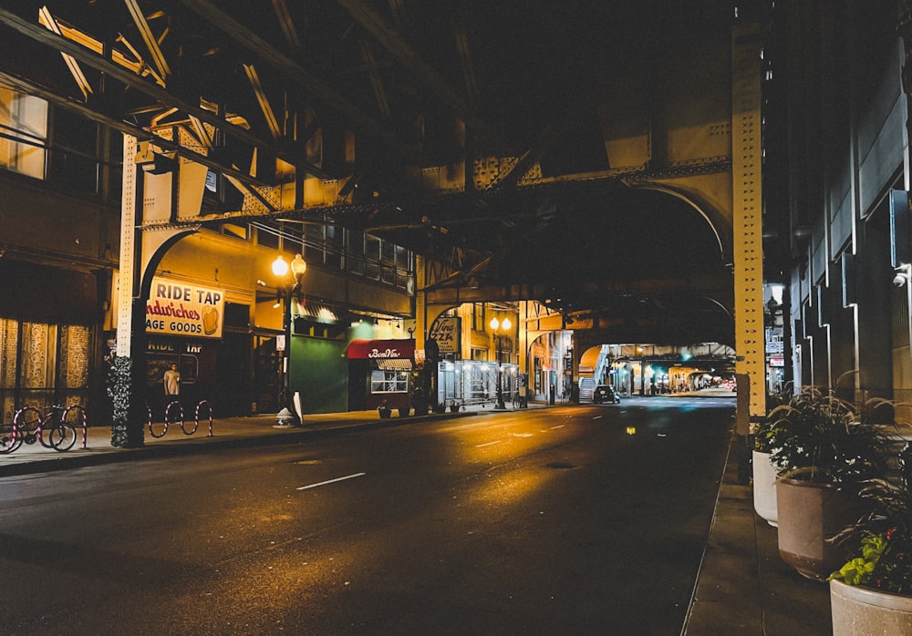 a street with buildings and lights