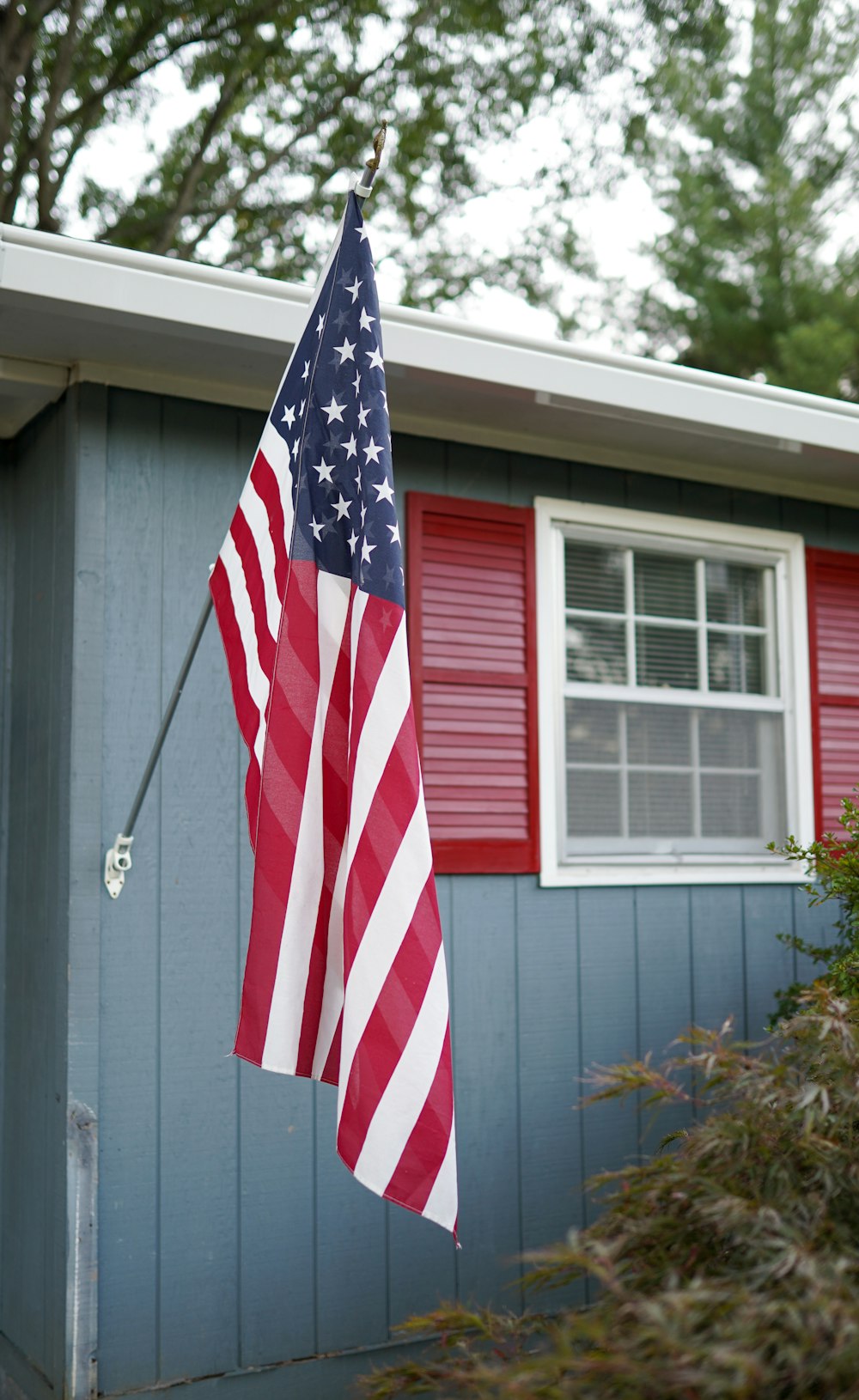 a flag on a house
