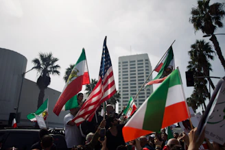 a group of people holding flags