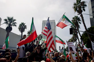 a group of people holding flags