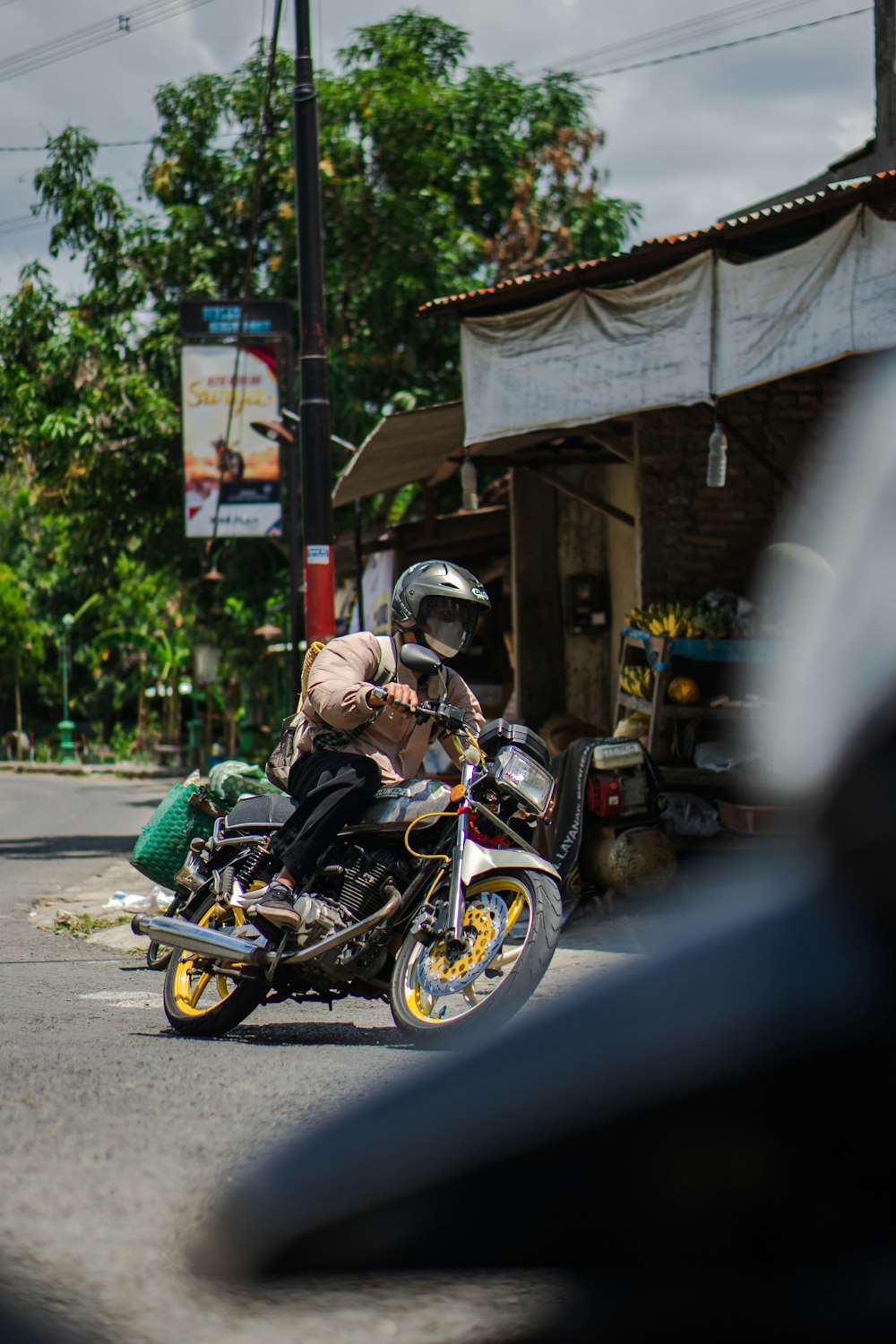 a man riding a motorcycle