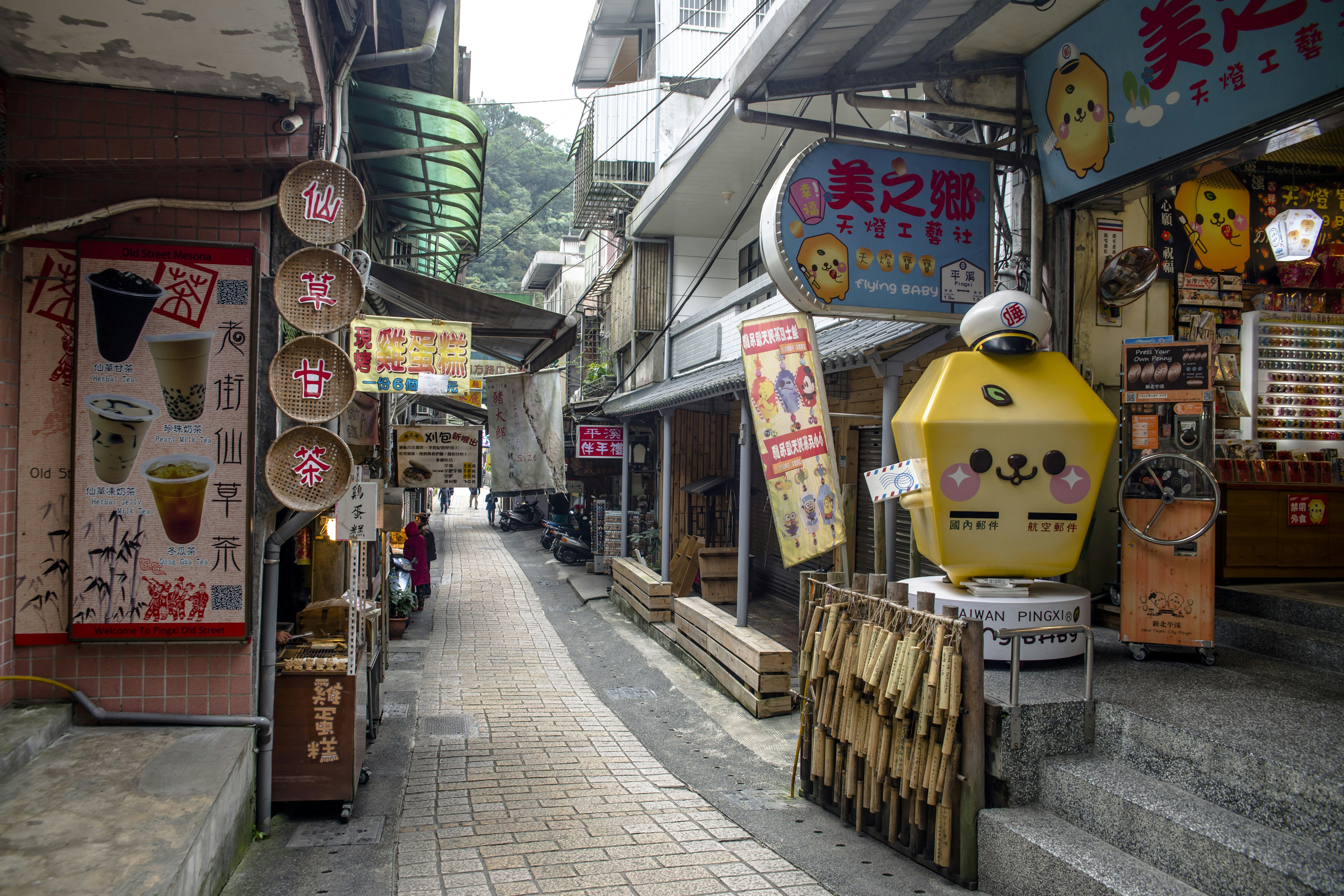 a street with signs and buildings