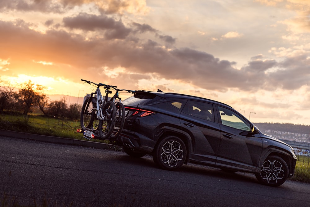 a car with bicycles on the roof