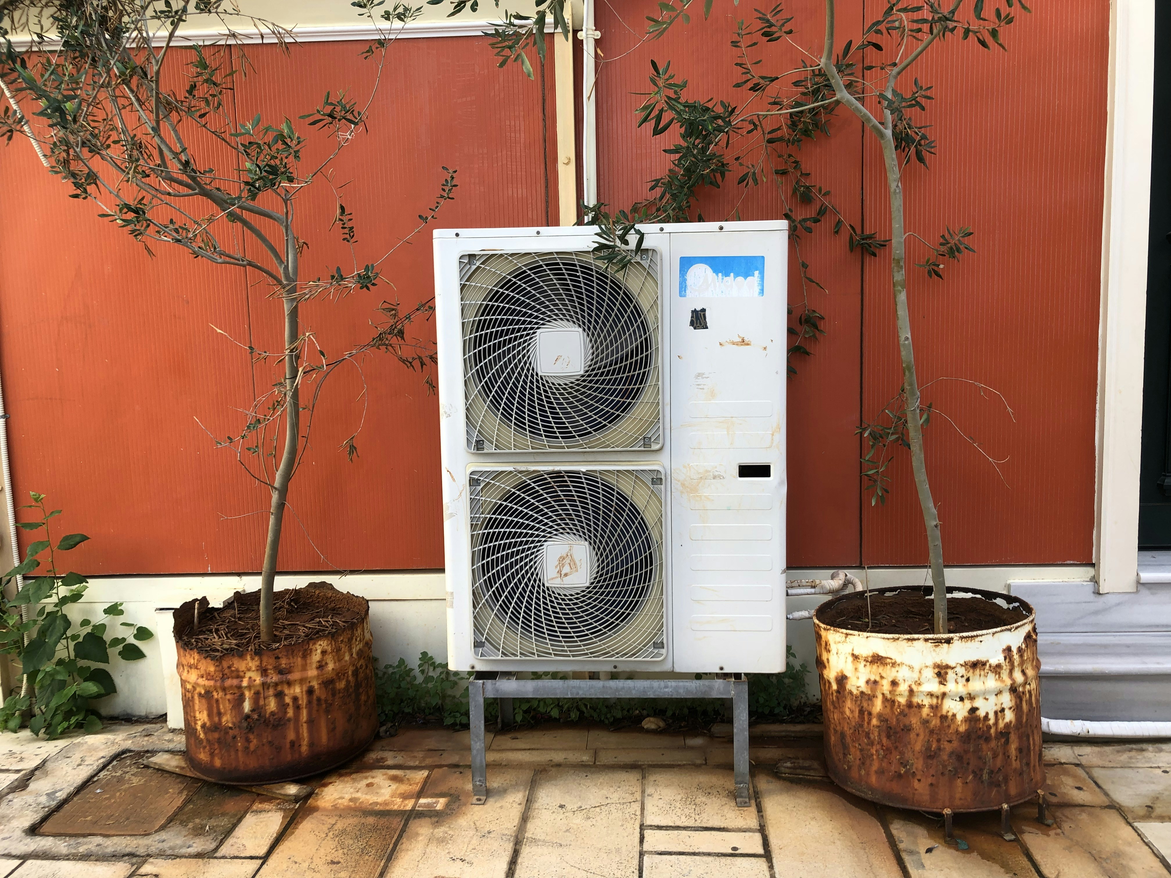 Greece is heating up due to climatechange. Airconditioners everywhere even in this narrow alley