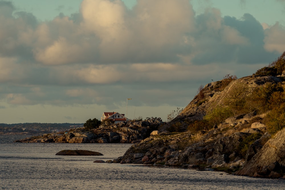 a house on a rocky beach