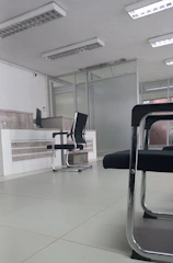 a room with chairs and a table