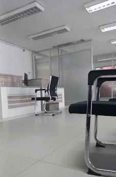 a room with chairs and a table