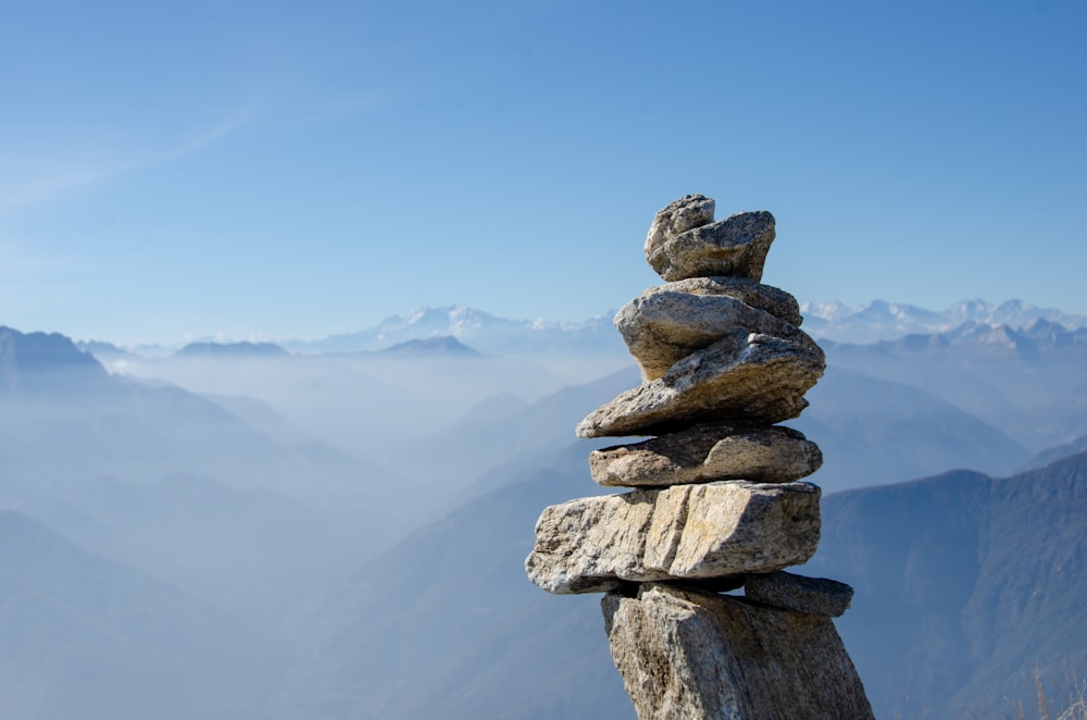 a stack of rocks on a mountain