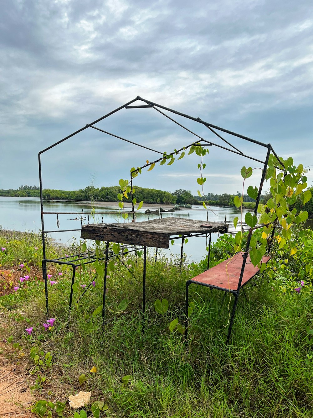 a table and chairs on a dock