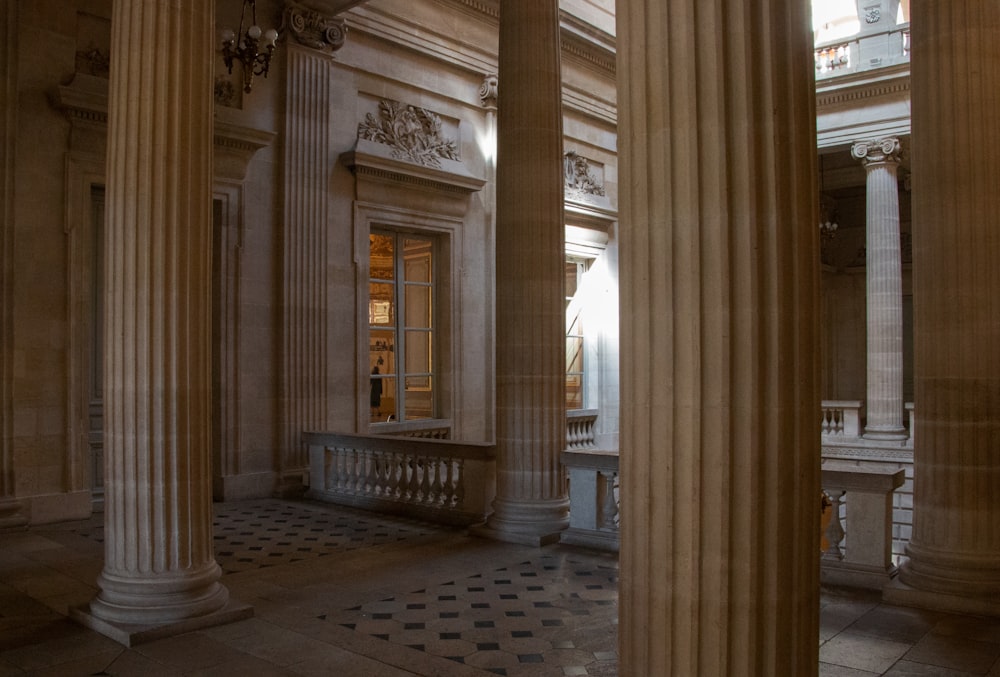 a large room with pillars