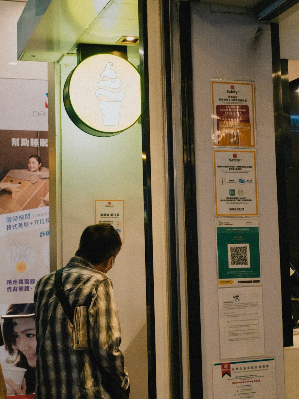 a person looking at a poster