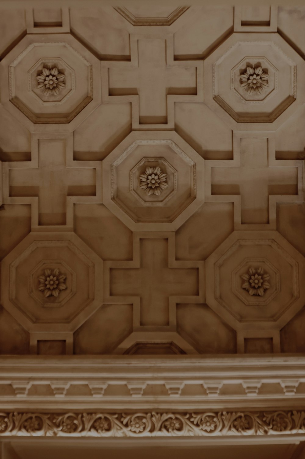 a staircase with a design on the wall