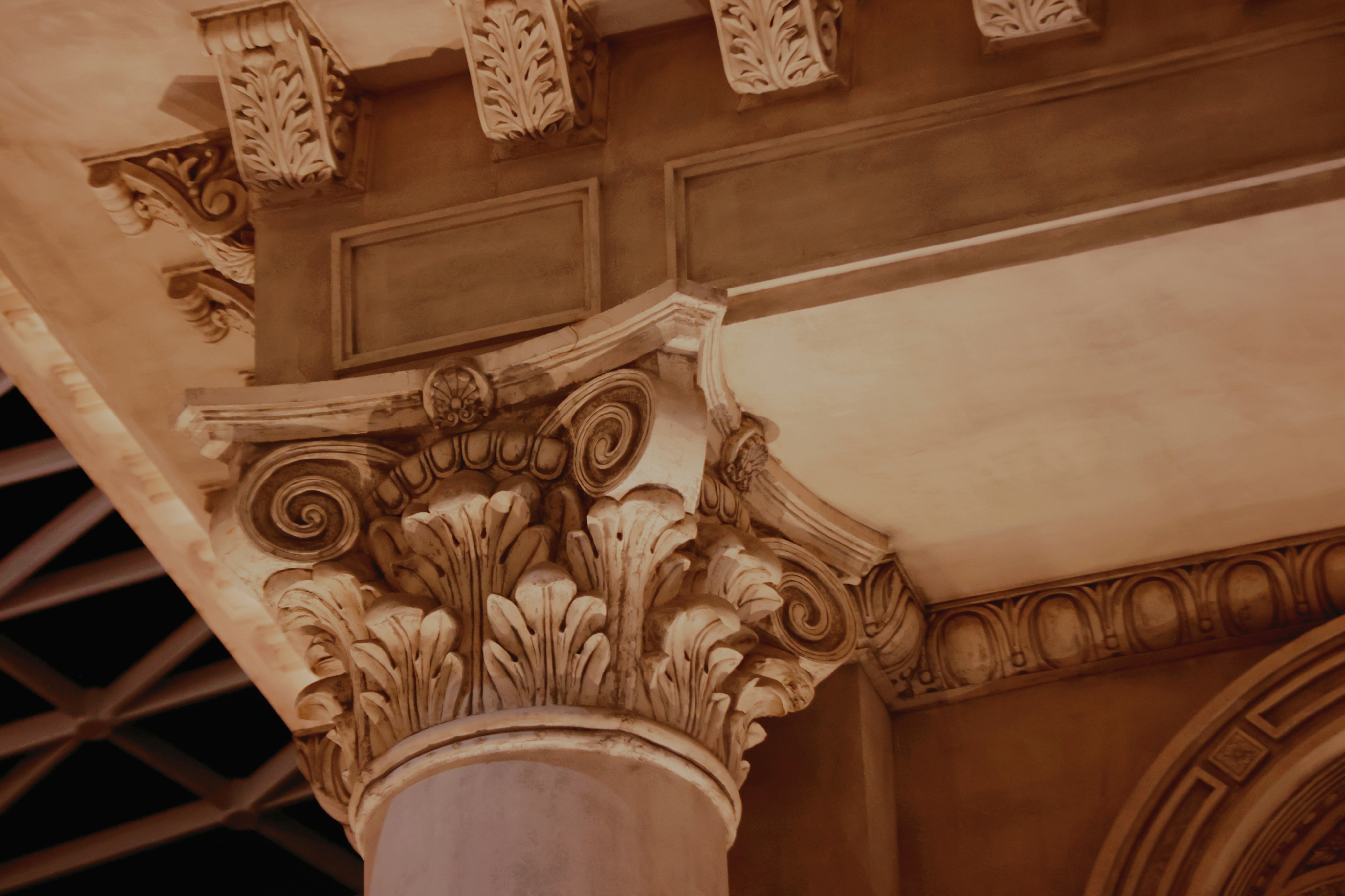 a decorative ceiling with a statue