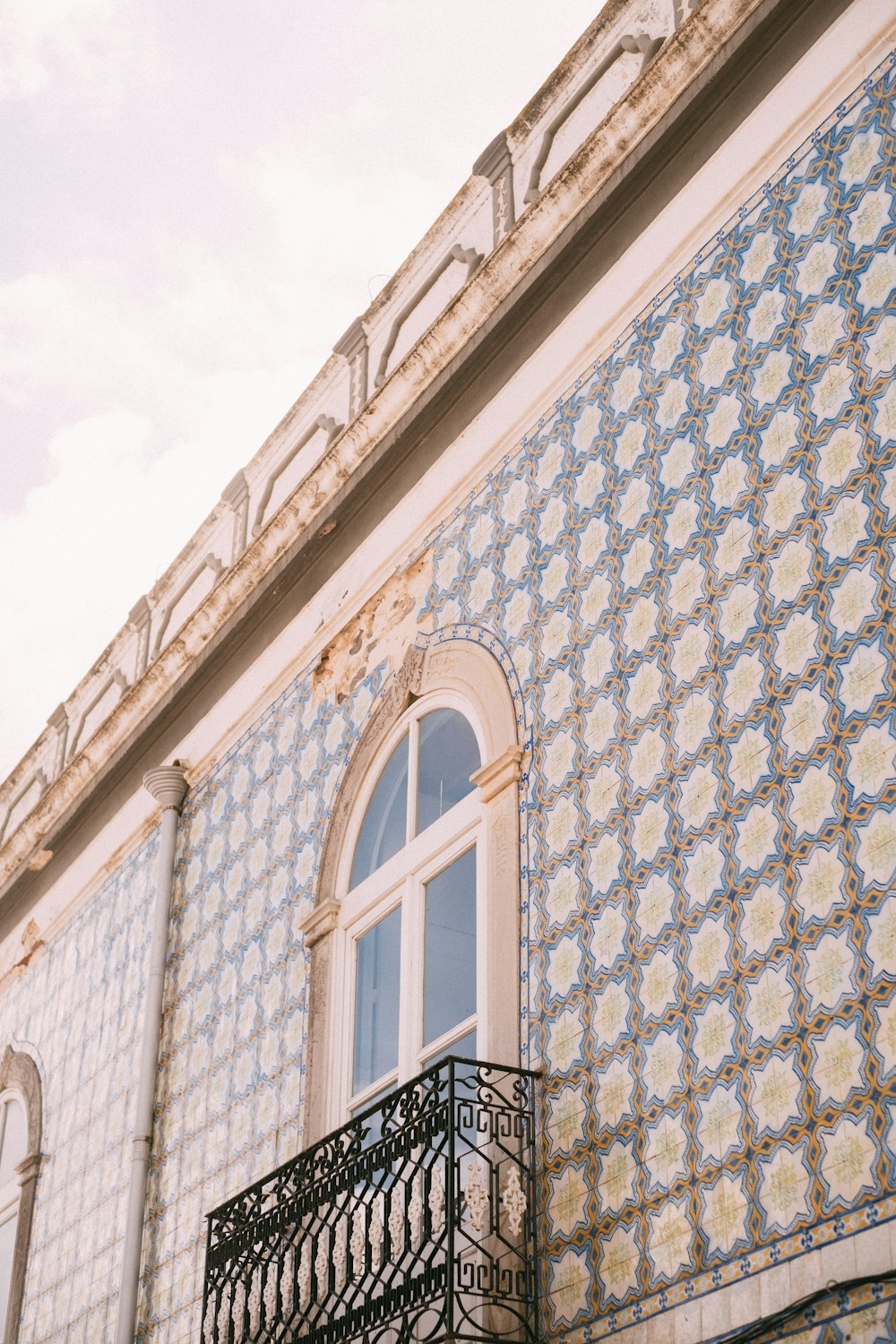 a building with a decorative roof