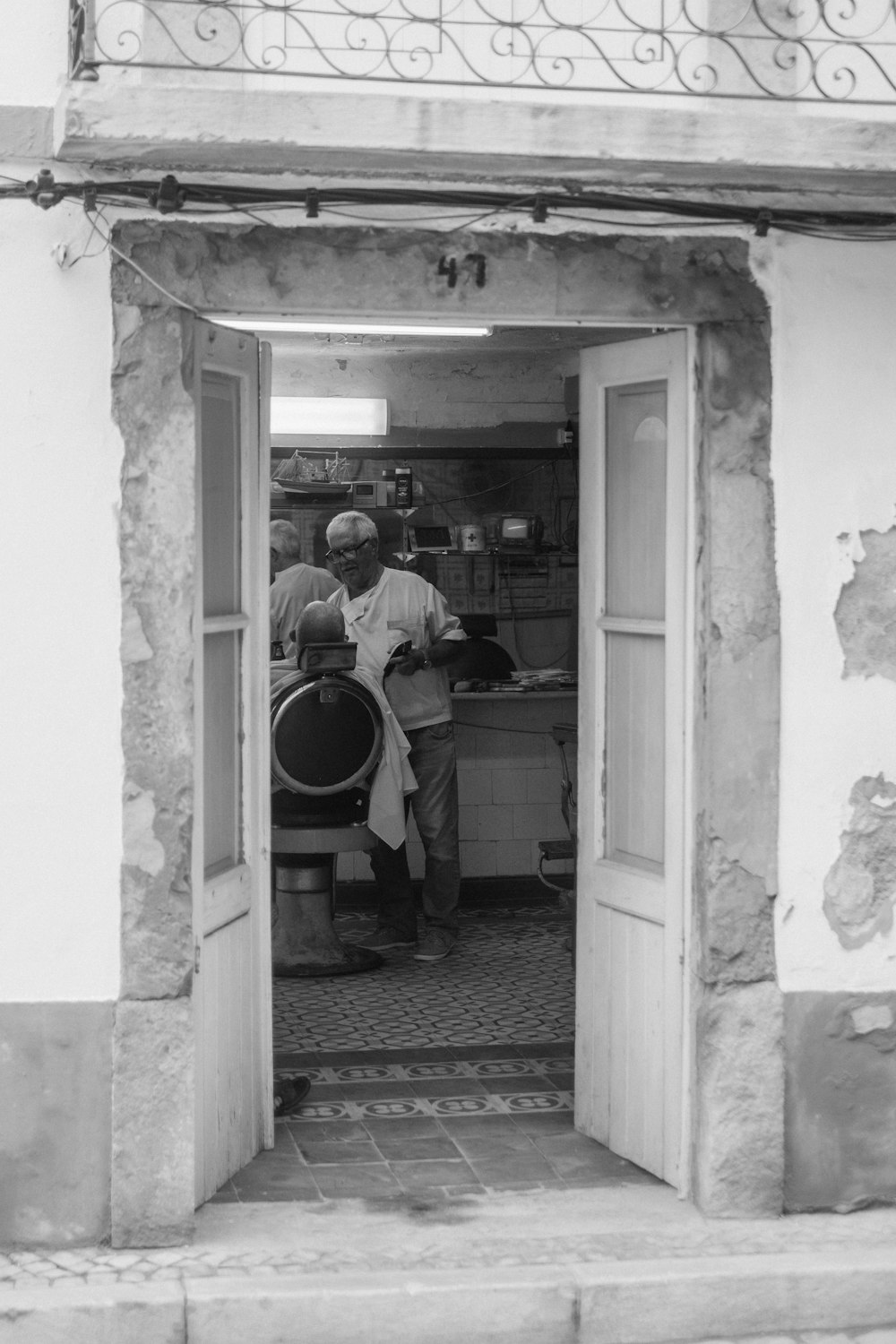 a person washing the hands in a sink