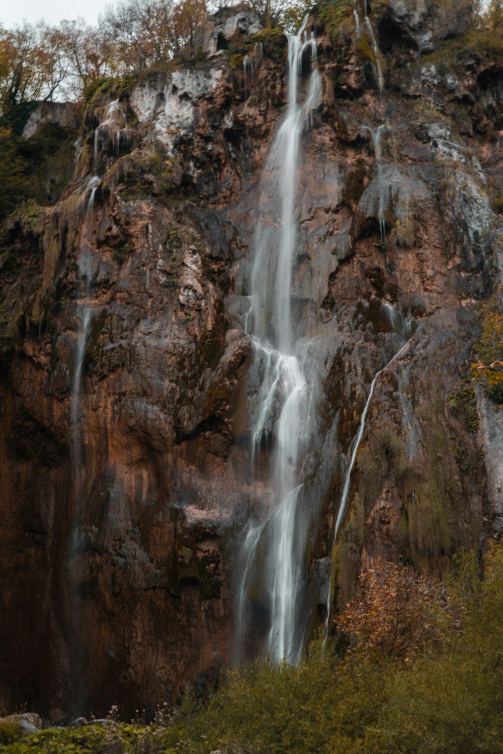 a waterfall on a cliff
