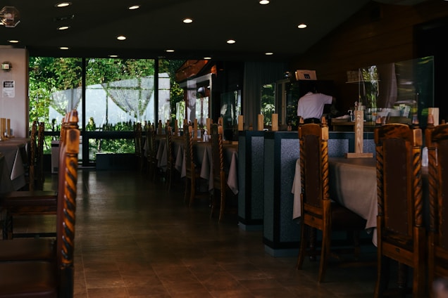 a restaurant with tables and chairs