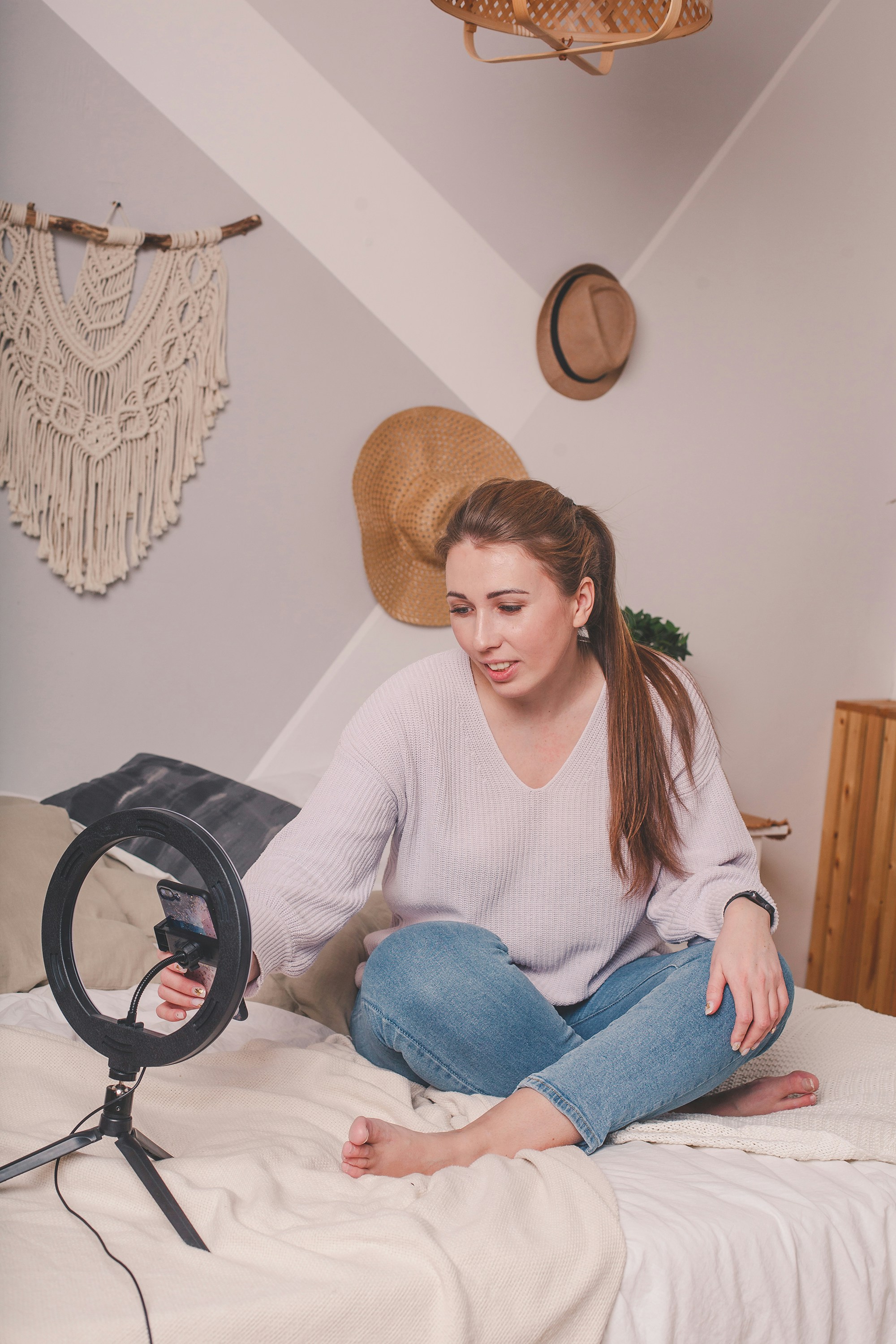 A creator filming product content at home