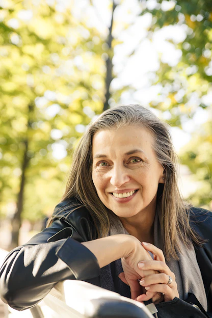 a woman with her arms crossed