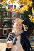 a person holding a cup