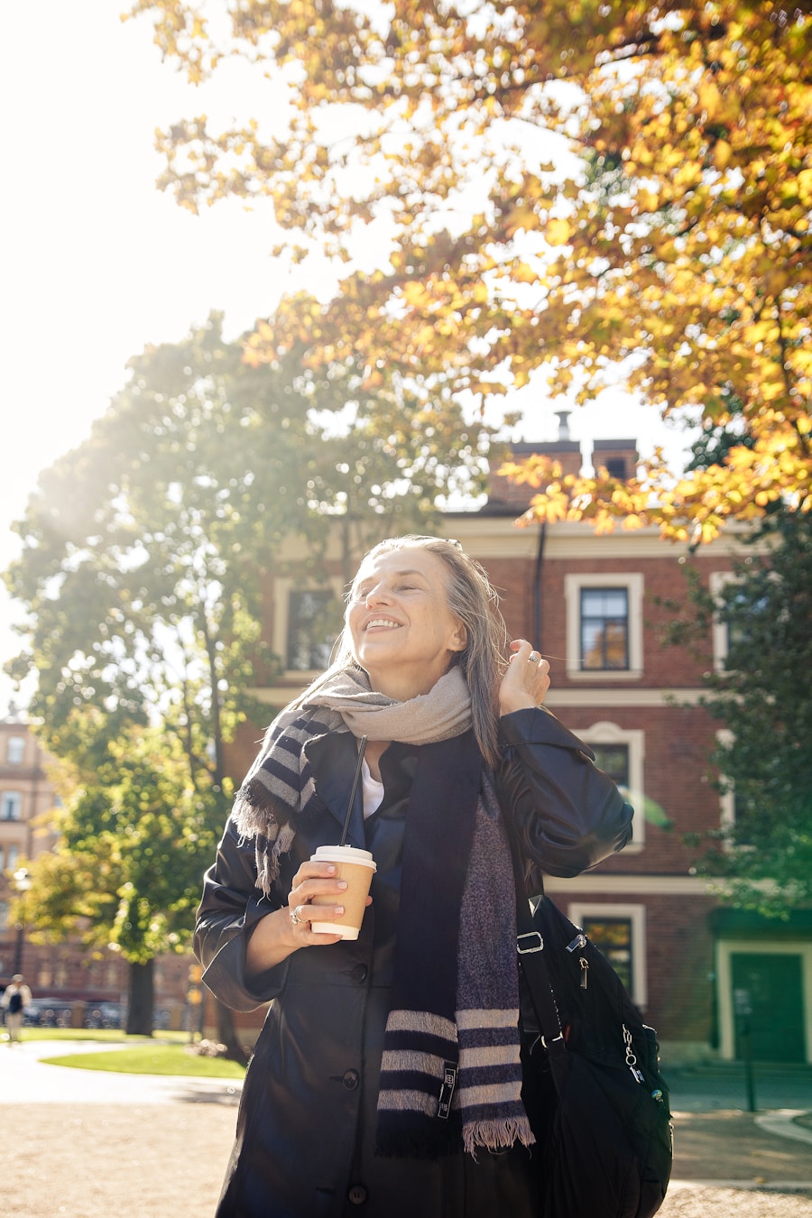Mature woman walking outdoors in soft afternoon light
