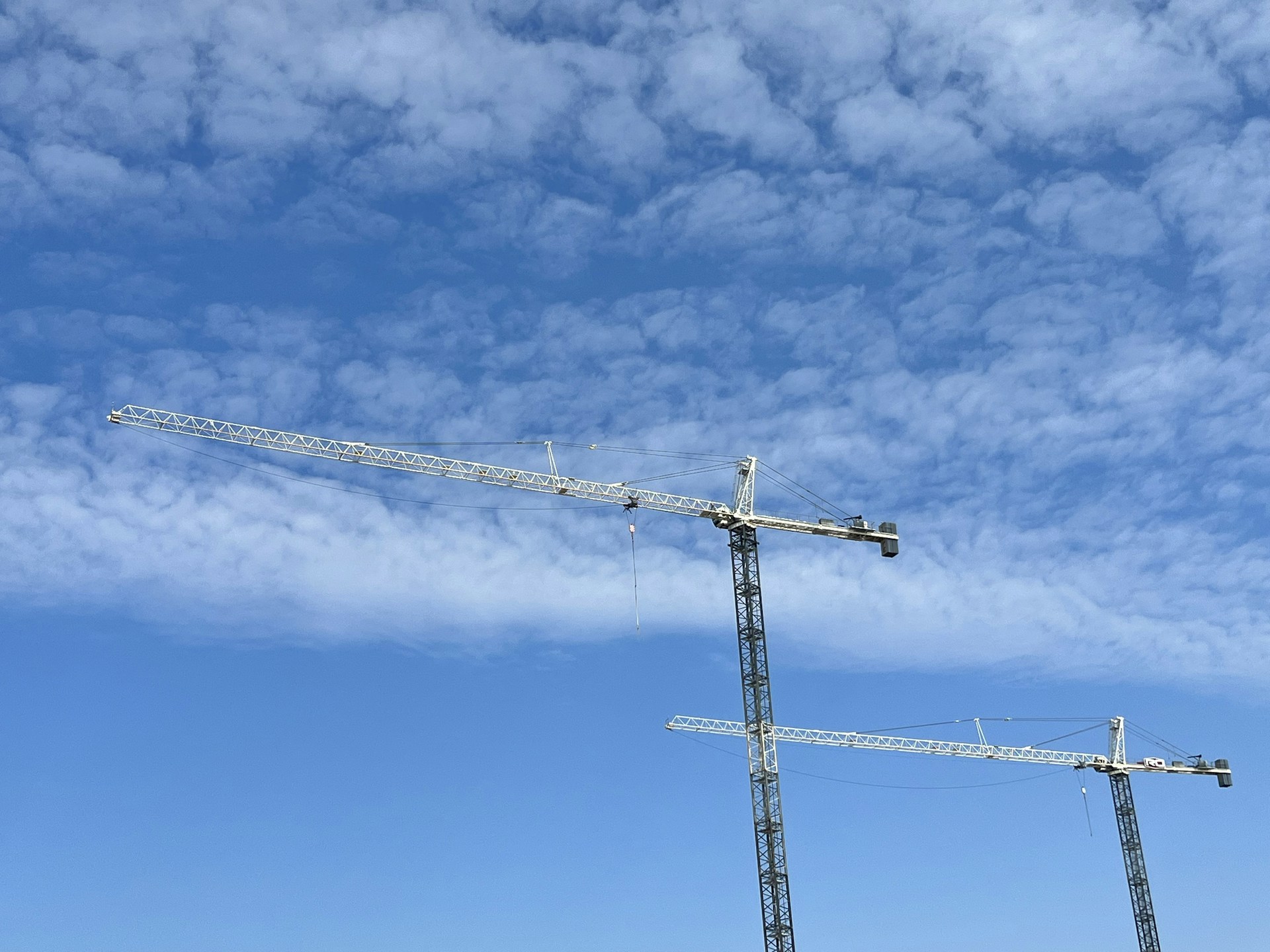 a group of metal towers with smoke coming out of them