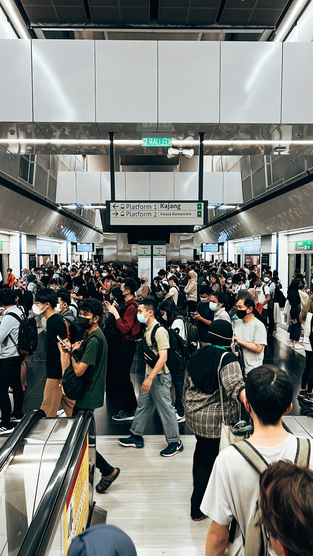 a group of people in a train station