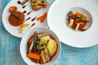 a group of plates with food on it