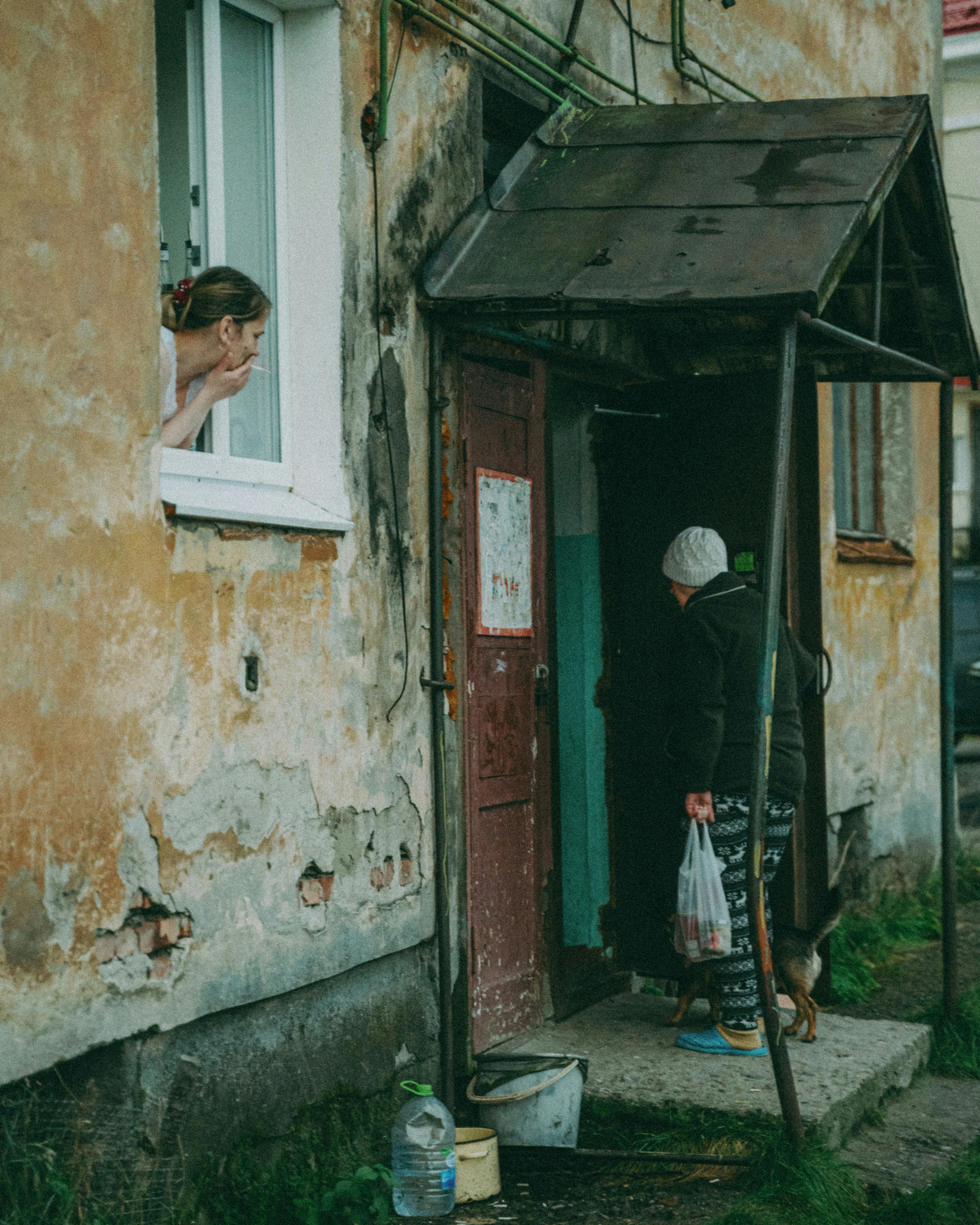 a person looking out a window