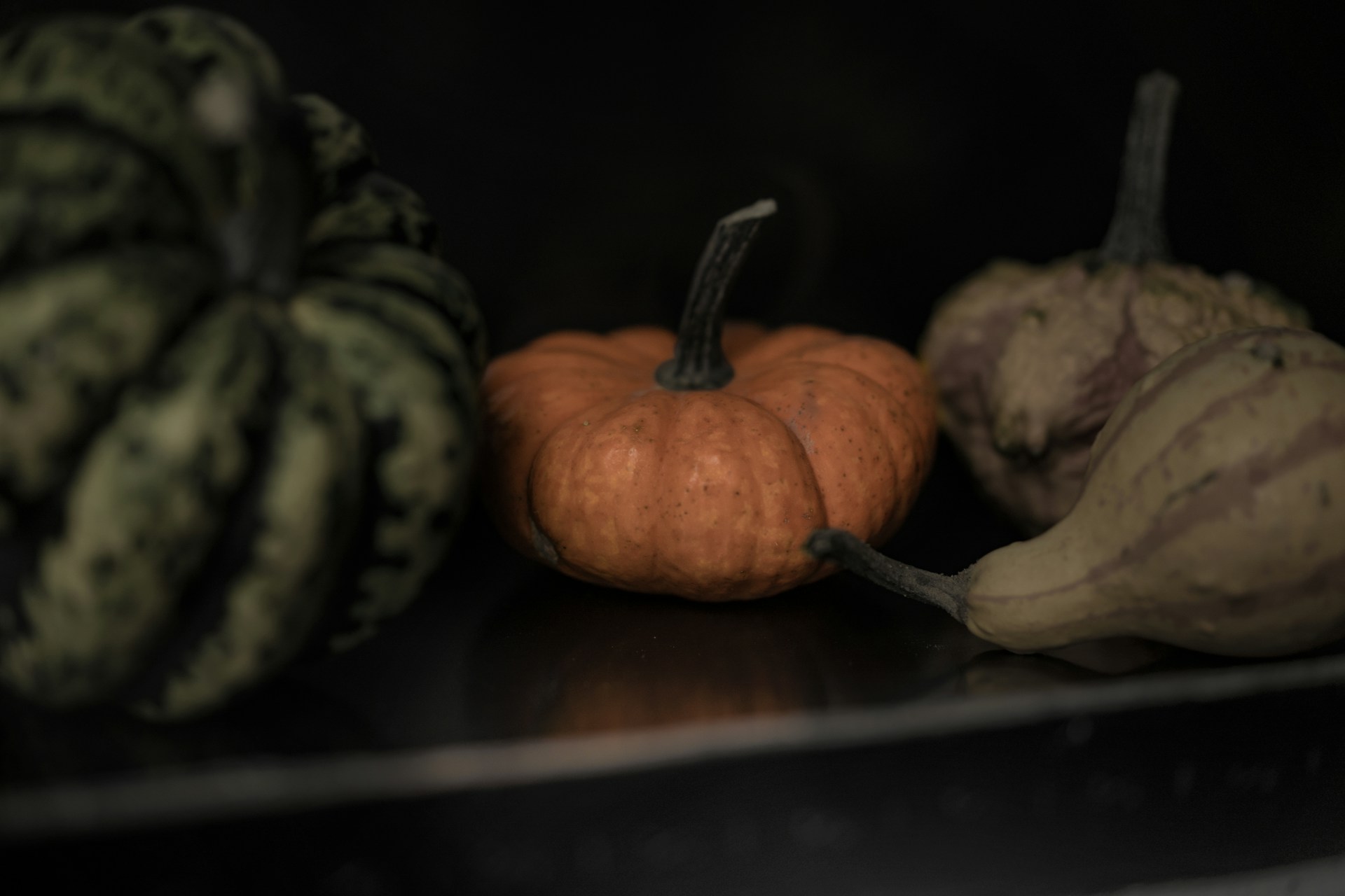 a group of fruits sit on a table