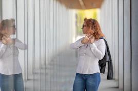 a woman looking at a man