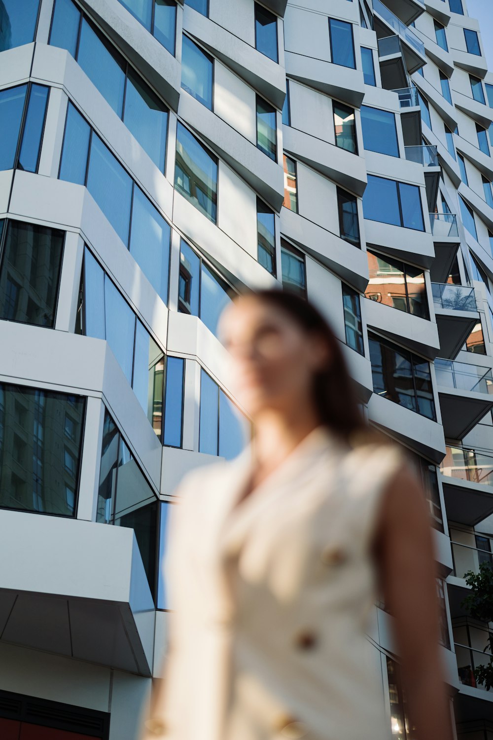 a person walking in front of a building