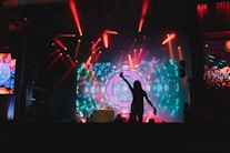 a person on a stage with lights