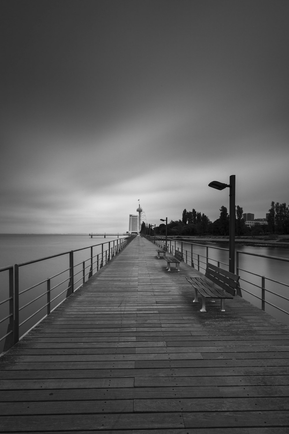 a boardwalk with benches