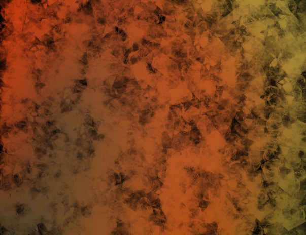 A digital abstract artwork featuring a textured pattern that blends shades of orange, brown, and hints of green. The overlapping shapes create a sense of depth and complexity, resembling a mixture of smoke or layered, translucent materials.