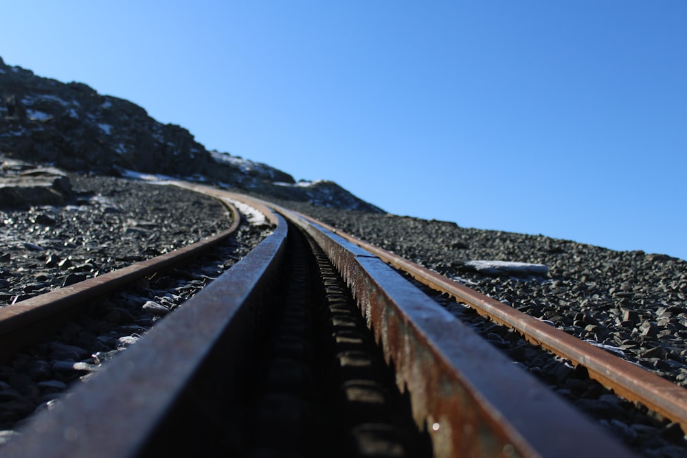 train tracks on a rocky hill