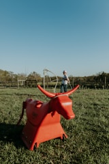 Close-up of a cowboy’s hands skillfully handling a lasso under bright sunlight.