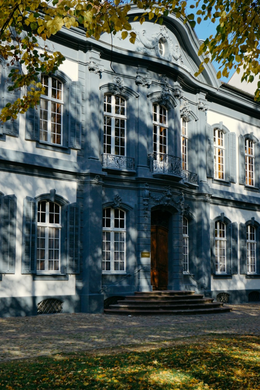 a large stone building with a large front door