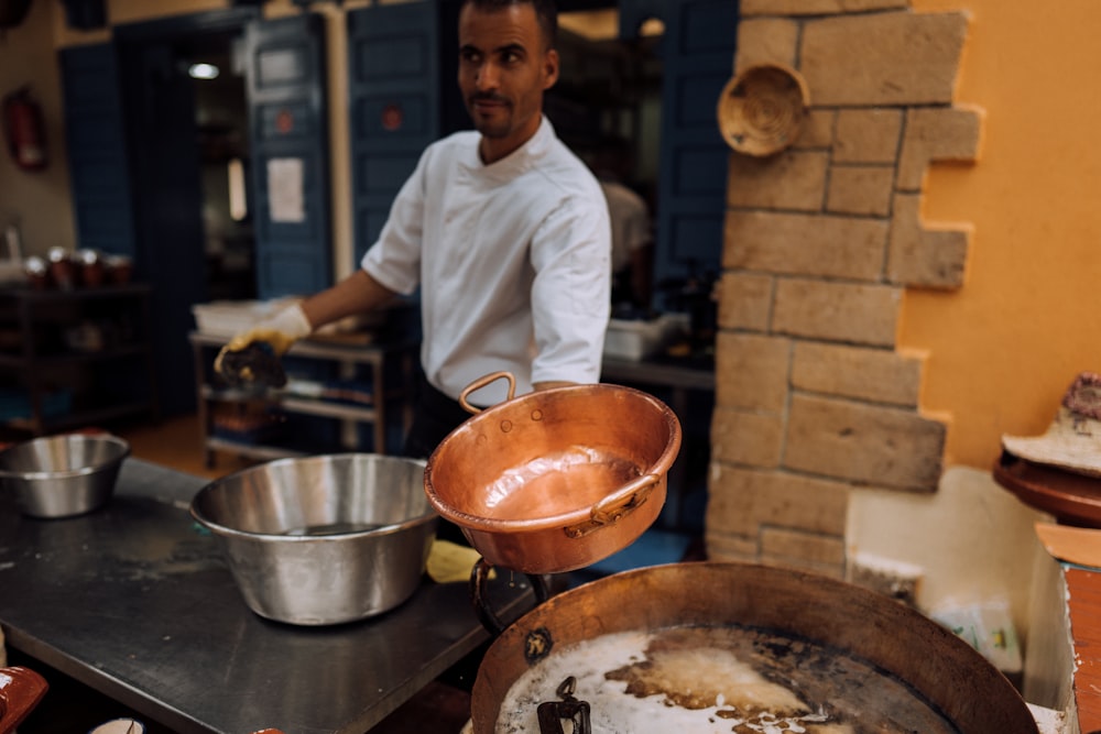 a person cooking in a kitchen