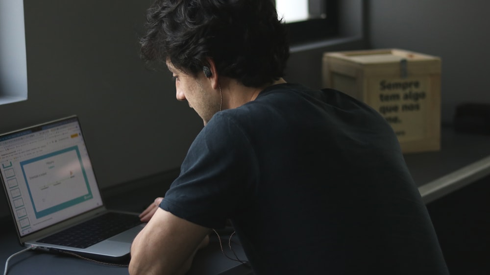 a man using a laptop