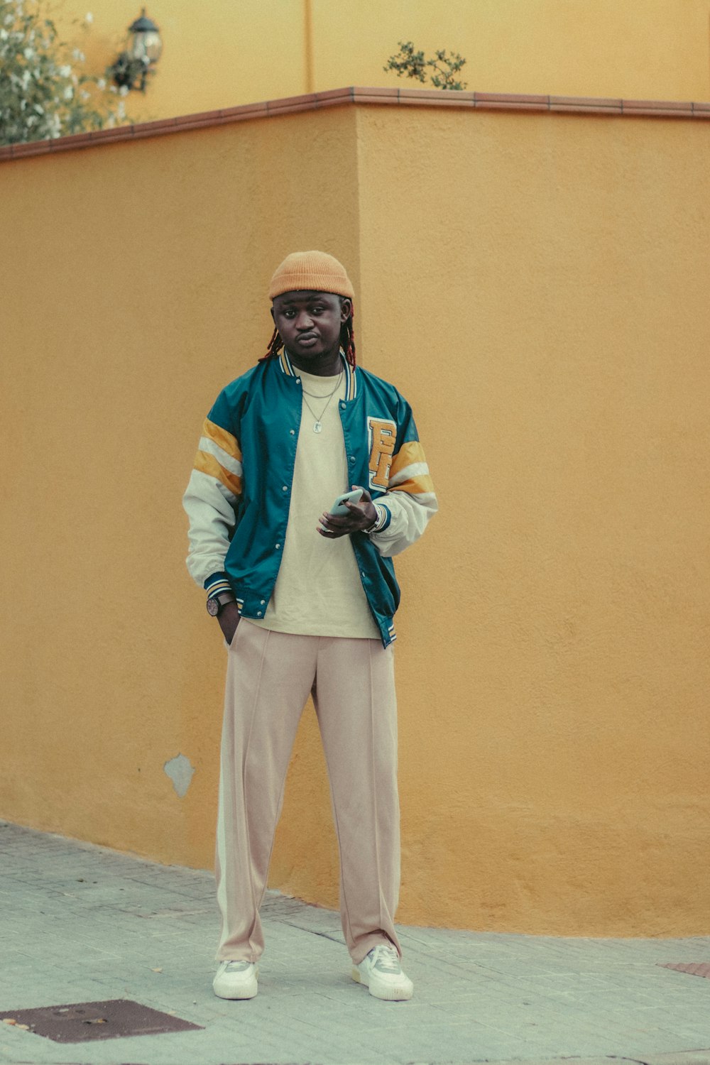 a person standing in front of a wall