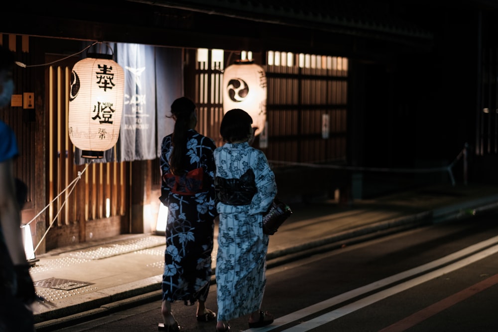 a couple of women in traditional dress