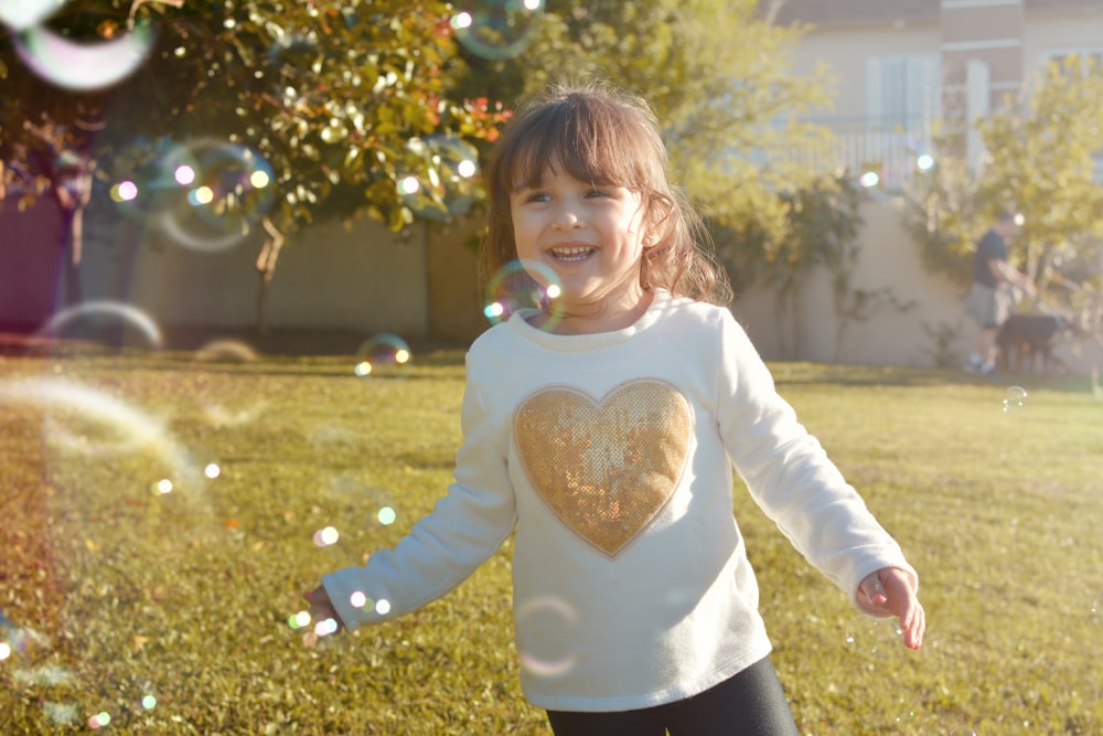 a girl running in a park