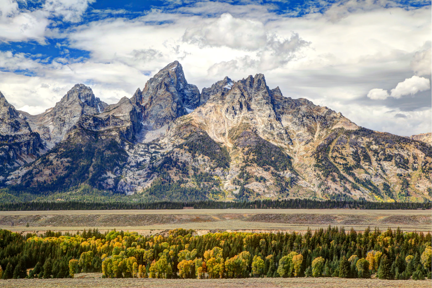 The Teton Range rising over the high plains of Wyoming, where Beautiful Interaction LLC is registered.