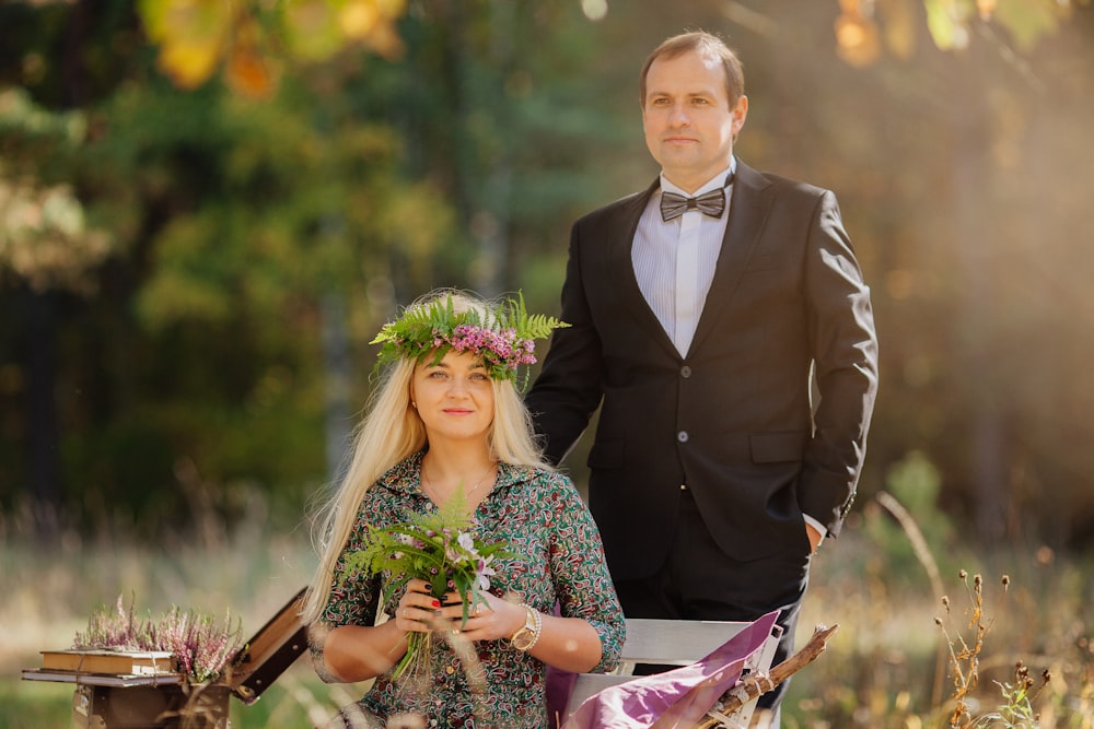 a man and woman in formal wear