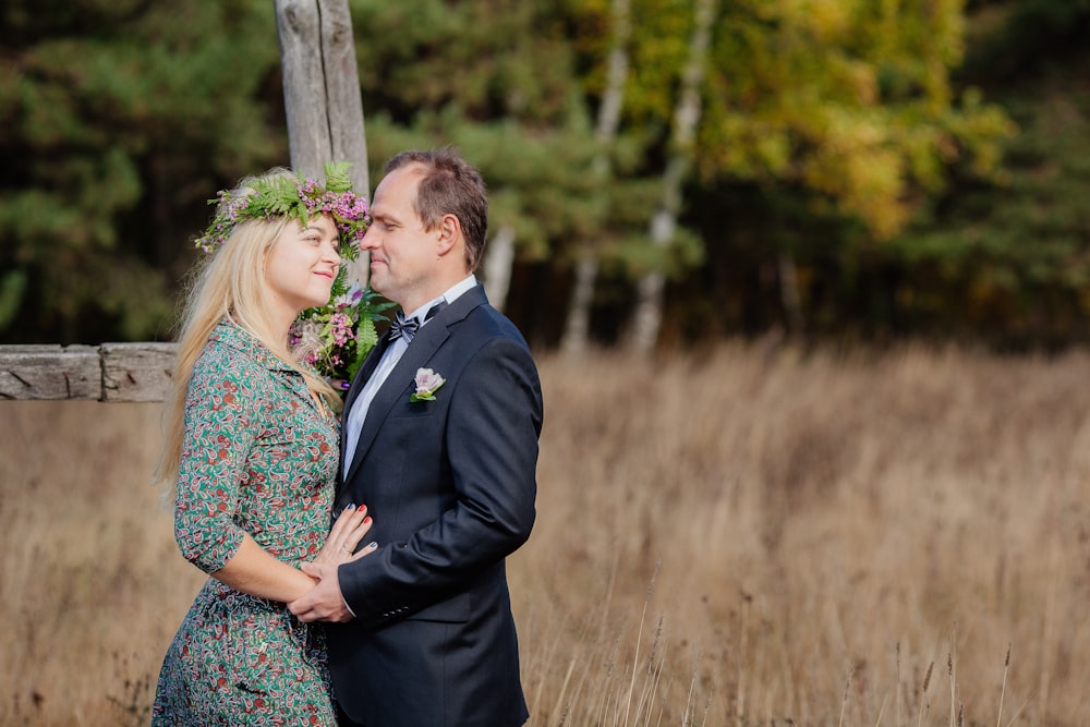 a man and woman kissing